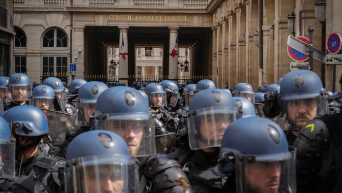 French court approves Macron’s plan to raise pension age as nationwide protests rage on